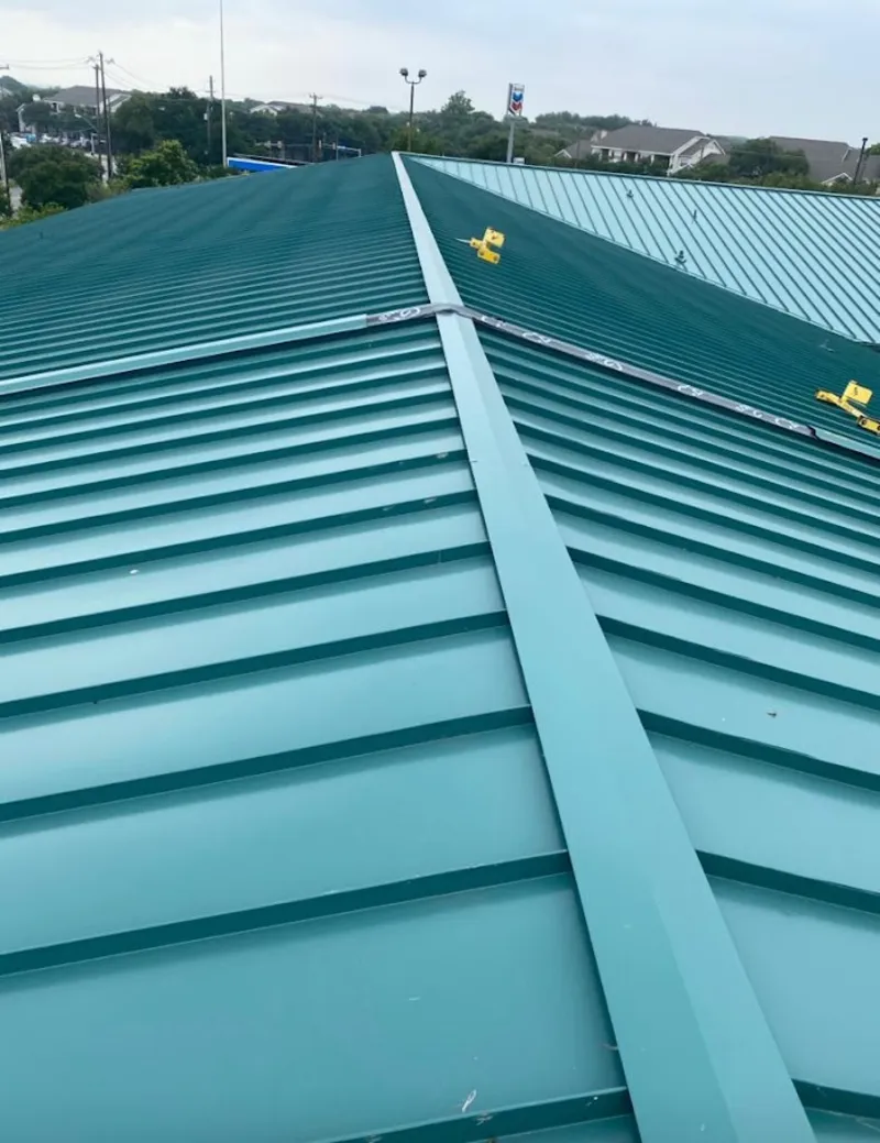 Green commercial metal roof ridge and valley for Metal Roof Repair in Chantilly